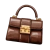 👜