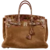 👜