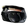 👜