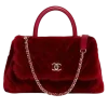 👜