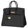 👜