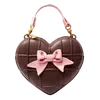 👜
