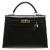 👜