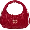 👜