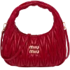 👜