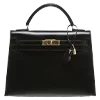 👜