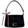 👜