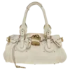 👜
