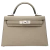 👜