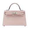 👜