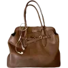 👜