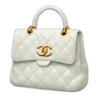 👜