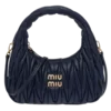 👜