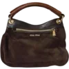👜