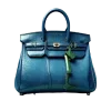 👜