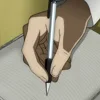 🖊