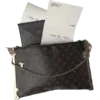 👜